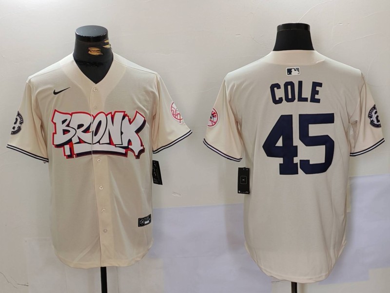Men's New York Yankees #45 Gerrit ColeCream The Bronx Graffiti V2 Vapor Limited Stitched Baseball Jersey 5 Men's New York Yankees #45 Gerrit ColeCream The Bronx Graffiti V2 Vapor Limited Stitched Baseball Jersey 5