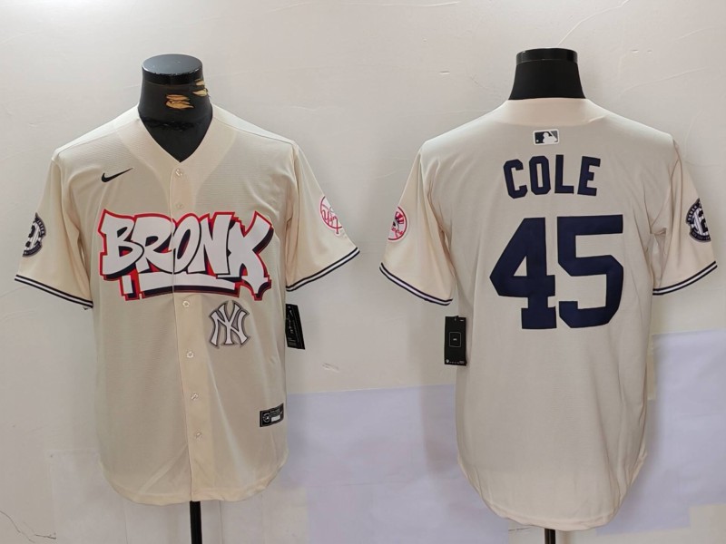 Men's New York Yankees #45 Gerrit ColeCream The Bronx Graffiti V2 Vapor Limited Stitched Baseball Jersey 2 Men's New York Yankees #45 Gerrit ColeCream The Bronx Graffiti V2 Vapor Limited Stitched Baseball Jersey 2